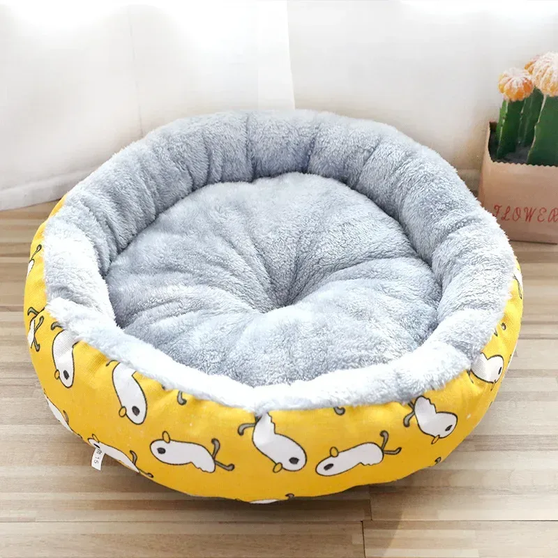 raised padded rim of the round plush dog bed