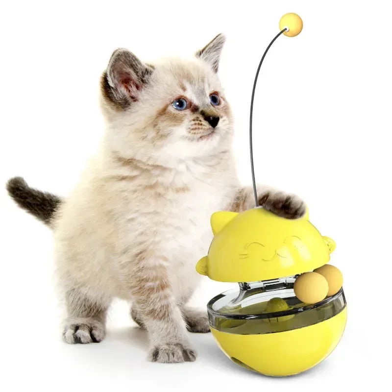 gioco dispenser per gatti giallo con parte superiore a muso di gatto