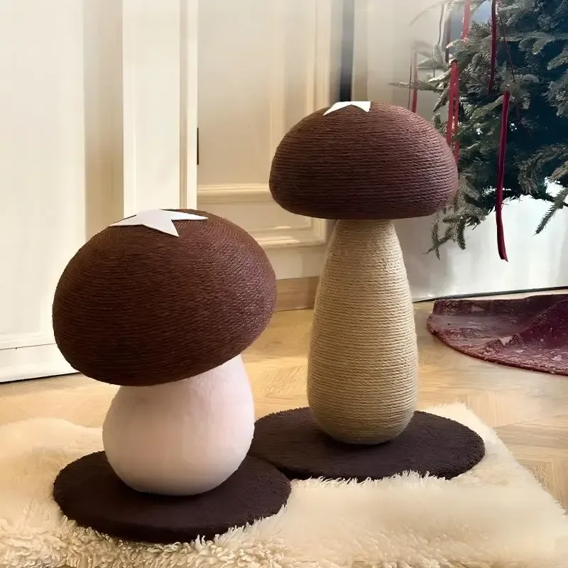 two mushroom cat scratchers on a rug