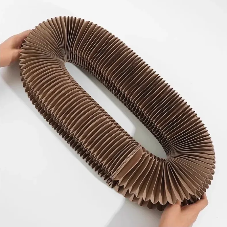 corrugated paper folds of the organ scratcher