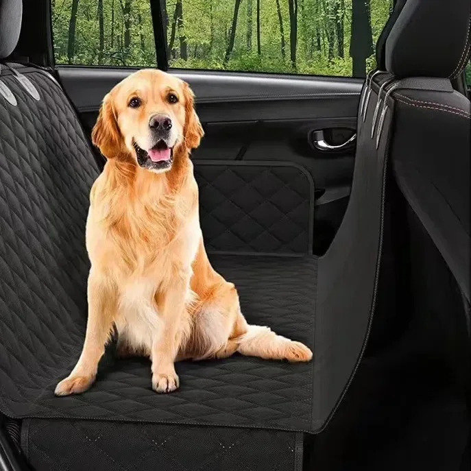 black quilted back seat cover with a dog